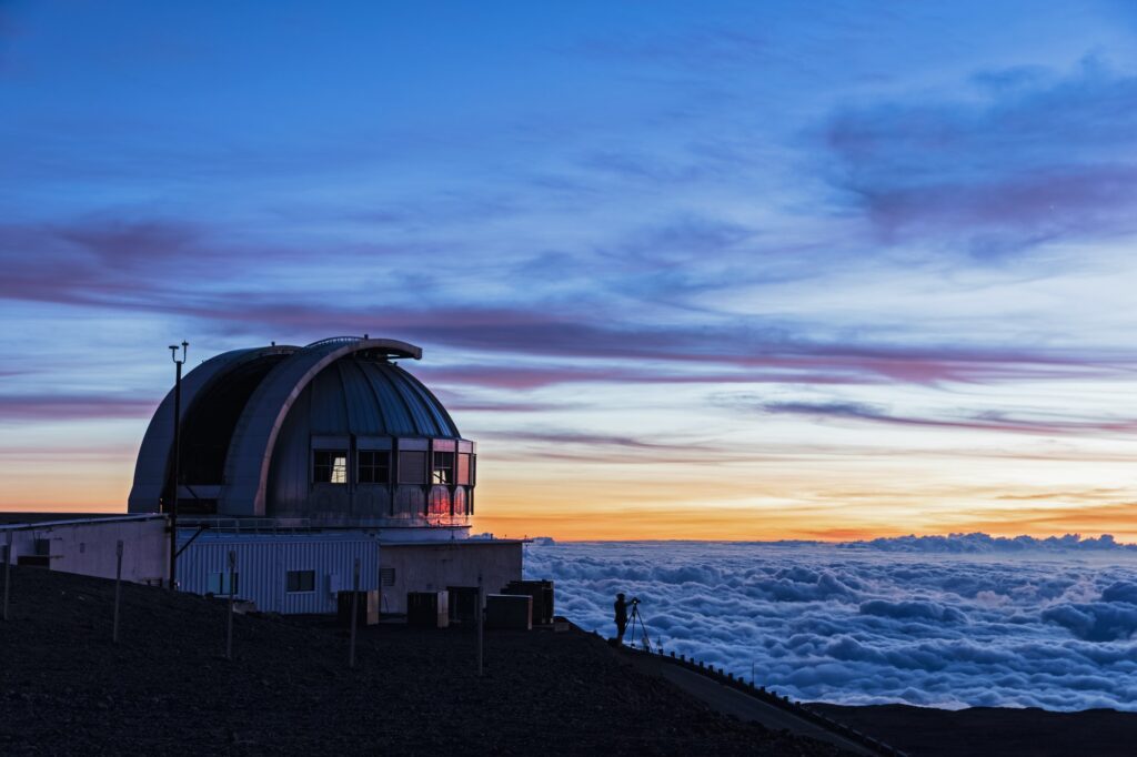USA, Hawaii, Mauna Kea volcano, telescopes at Mauna Kea Observatories at sunset