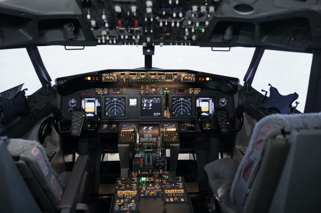 No people in airplane cockpit used by captain and copilot to fly